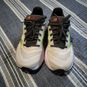 New Balance Cream and Black Athletic Shoes with Green Accents